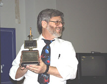 Dr. Paul Shuch holding the 2000 Bruno Award
